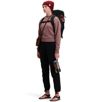 Front model shot of Topo Designs Women's Dirt Pants in 100% organic cotton with drawstring waist in "Black"