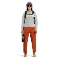 Model wearing Topo Designs Women's Global Sweater recycled Italian wool crewneck pullover in "gray"