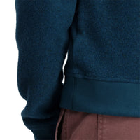 General shot of Topo Designs Women's Global Sweater recycled Italian wool crewneck pullover in "pond blue"