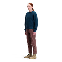 General shot of Topo Designs Women's Global Sweater recycled Italian wool crewneck pullover in "pond blue"