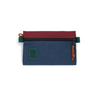 Topo Designs Accessory Bag in "Small" "Pond Blue / Zinfandel - Recycled" red nylon.