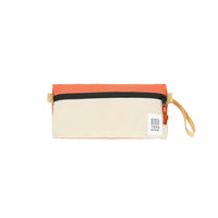 Topo Designs Dopp Kit toiletry travel bag in recycled "Bone White / Coral - Recycled" pink nylon.